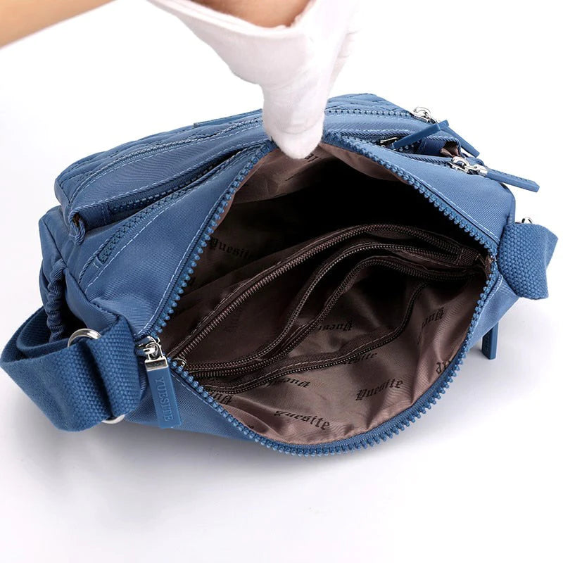 Clara - Sac à dos Let avec sangle ajustable et poches zippées