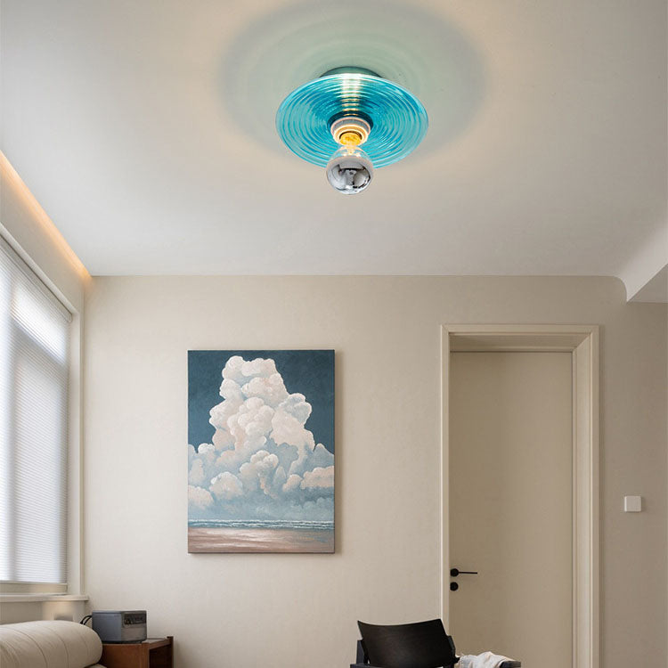 Applique murale intemporelle en verre pour un éclairage polyvalent