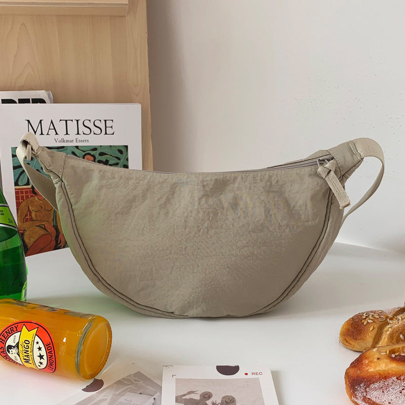 CurveCross - Sac crossbody courbé élégant pour une mode en déplacement