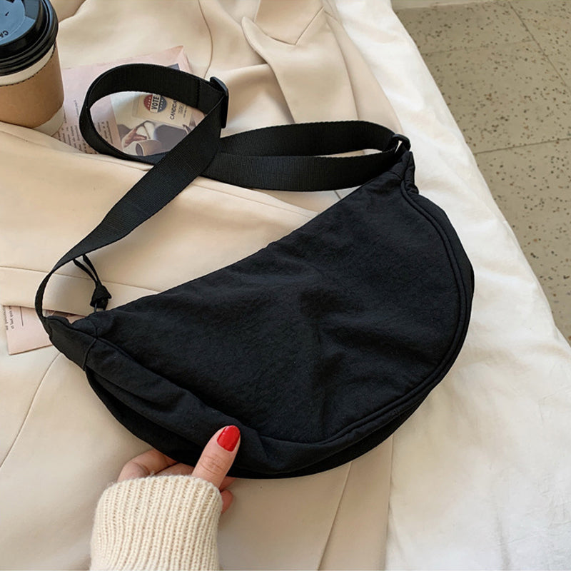 CurveCross - Sac crossbody courbé élégant pour une mode en déplacement