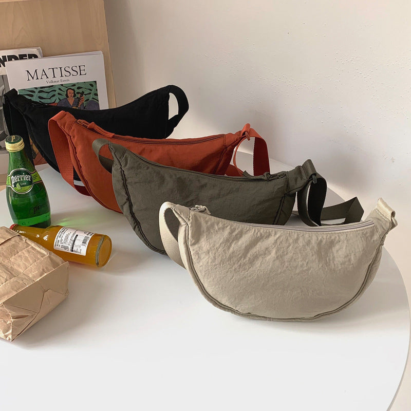 CurveCross - Sac crossbody courbé élégant pour une mode en déplacement