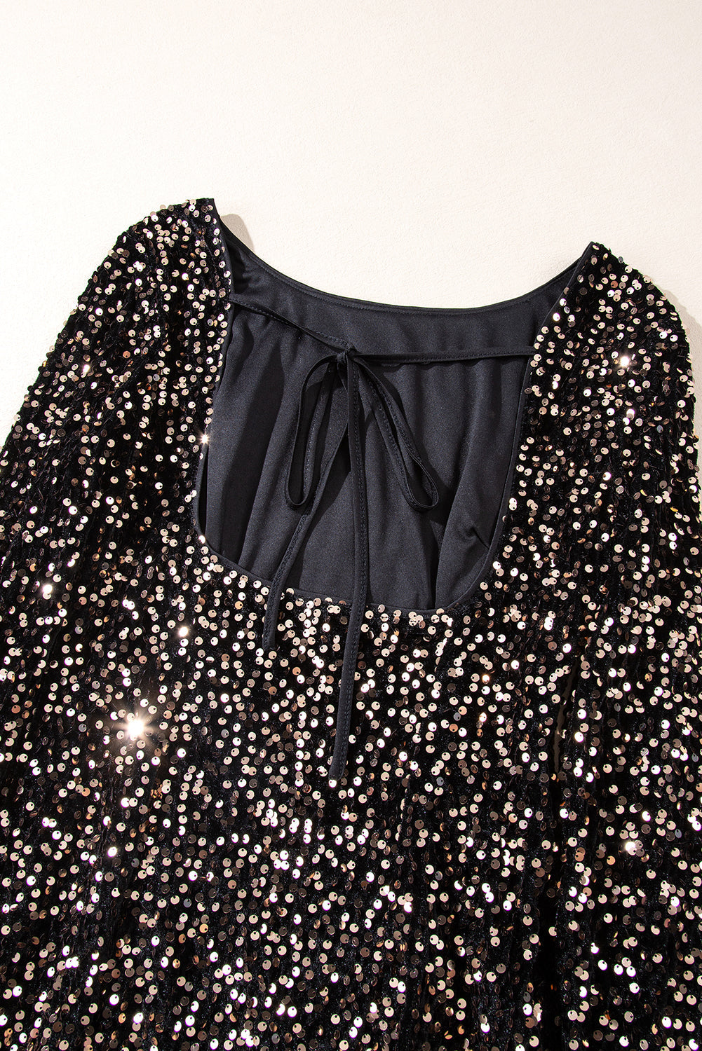 Sofia - Mini robe avec paillettes et fente