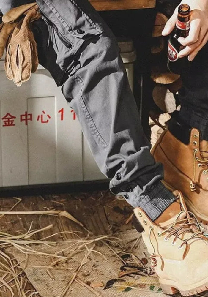 Calvin - Pantalon cargo pour homme avec jambes coniques et design à poches multiples