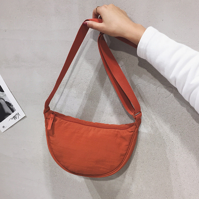CurveCross - Sac crossbody courbé élégant pour une mode en déplacement