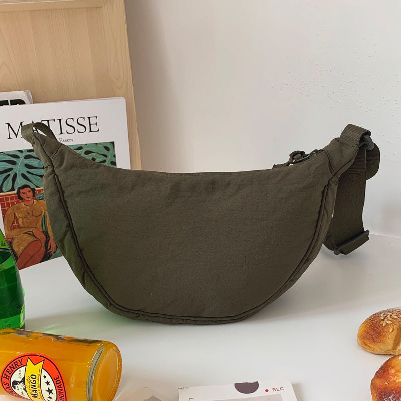 CurveCross - Sac crossbody courbé élégant pour une mode en déplacement