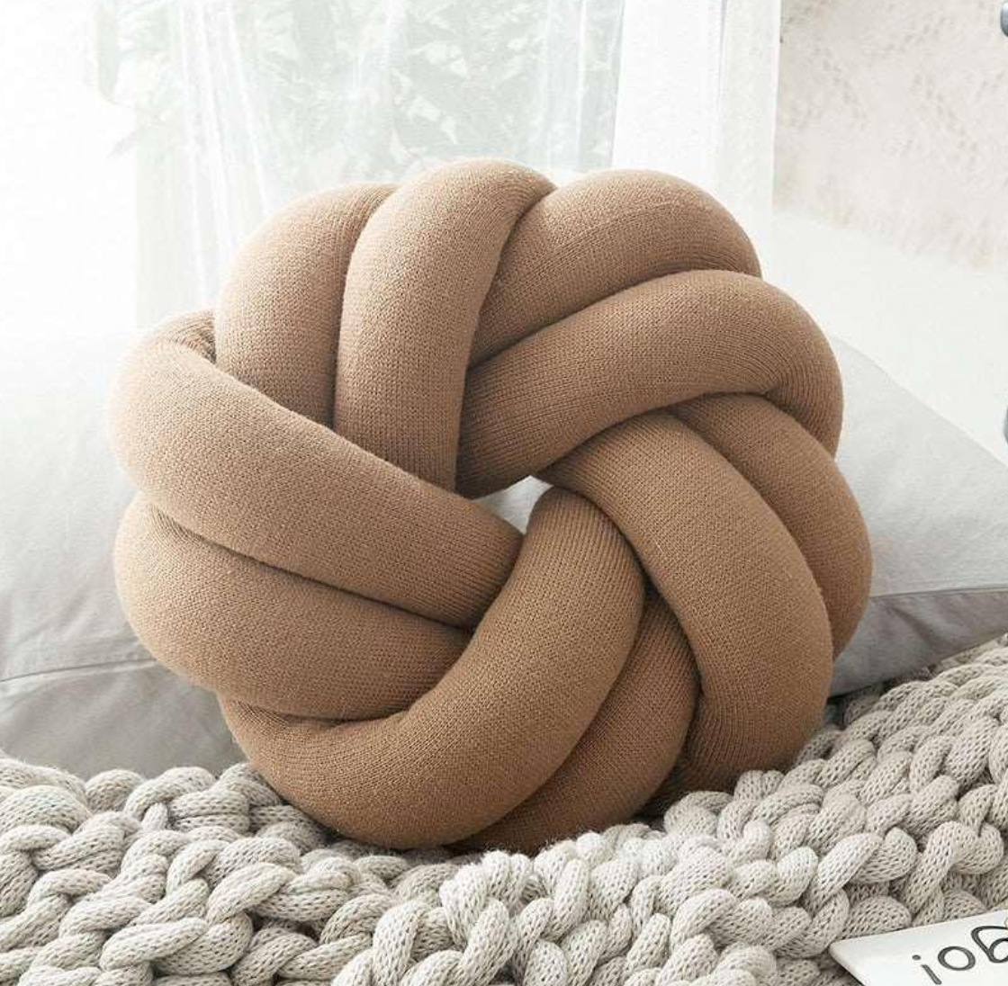 Coussin à nœud tissé chic pour un confort moderne