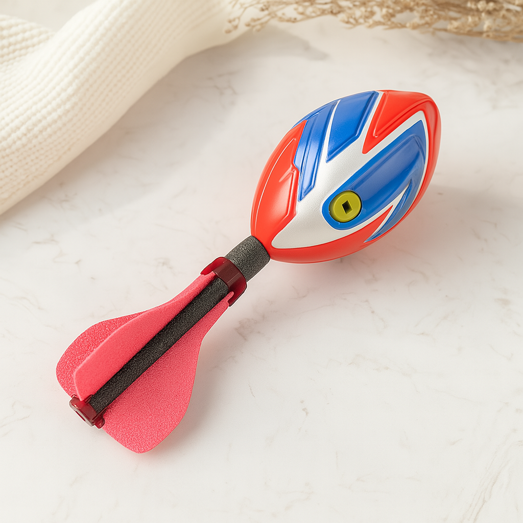 Balle-fusée sifflante en mousse – Jouet à lancer en PU avec effets sonores et queue en EPE pour un jeu longue distance