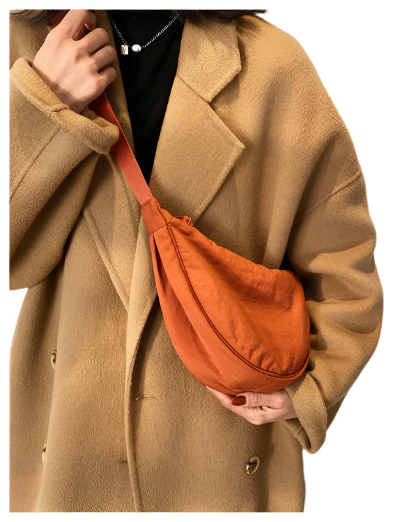 CurveCross - Sac crossbody courbé élégant pour une mode en déplacement