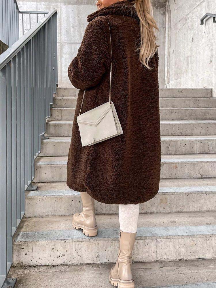 Manteau élégant avec col en fausse fourrure