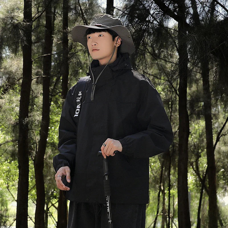 Veste coupe-vent à capuche unisexe ComfortFit avec fermeture éclair assortie