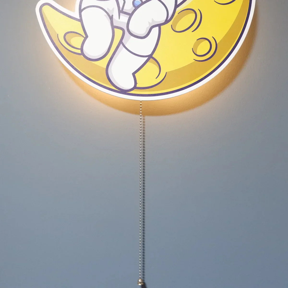 AstroLight - Lampe murale astronaute avec une touche magique