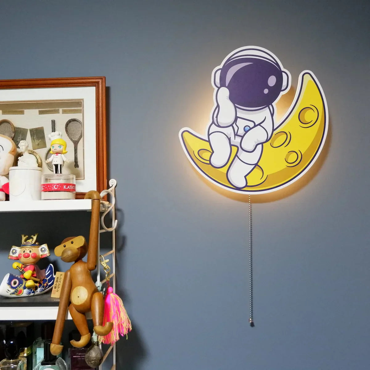 AstroLight - Lampe murale astronaute avec une touche magique