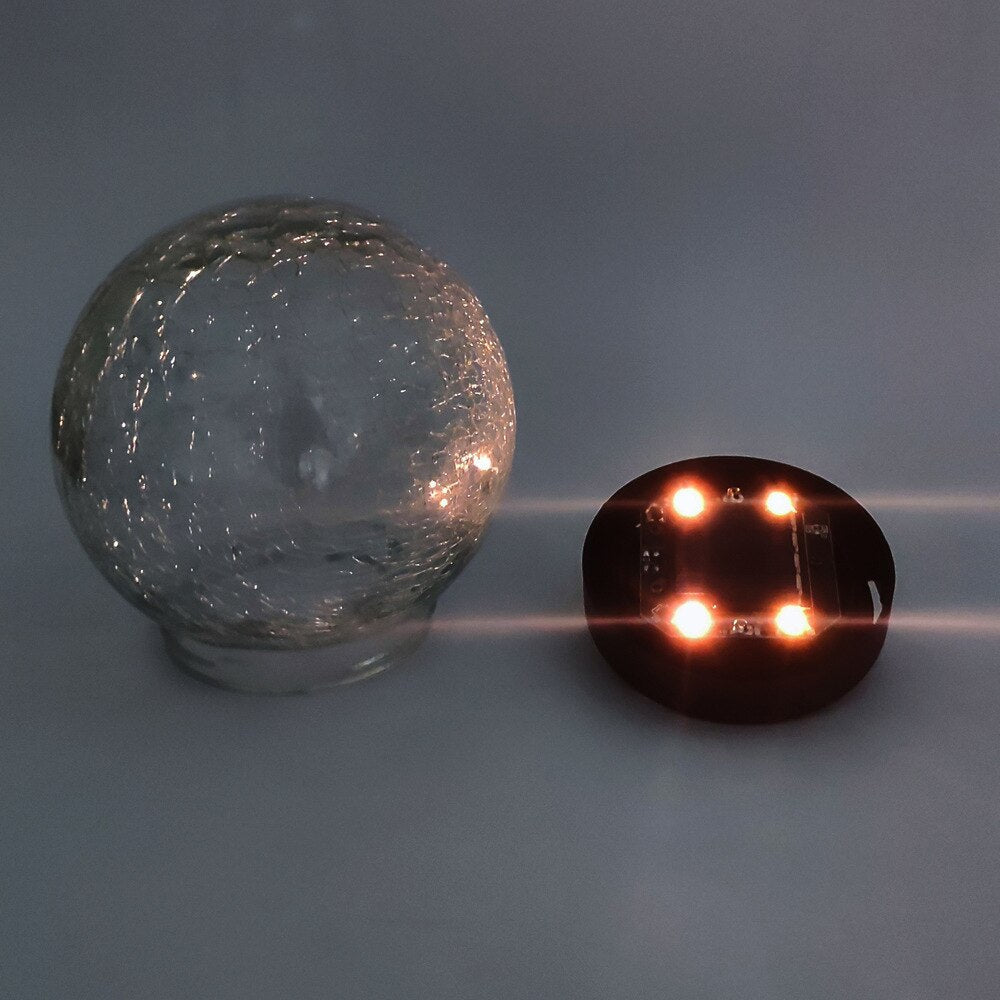 GlowGlobe - Lampe en verre tricotée solaire avec piquet de terre