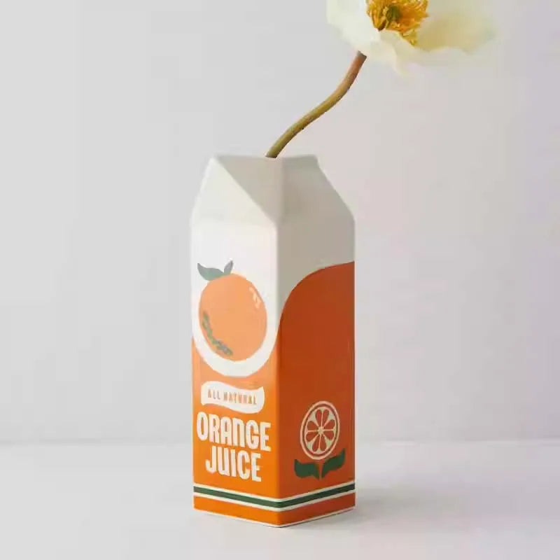 PlayfulBlooms - Vase inspirée de carton de jus d'orange