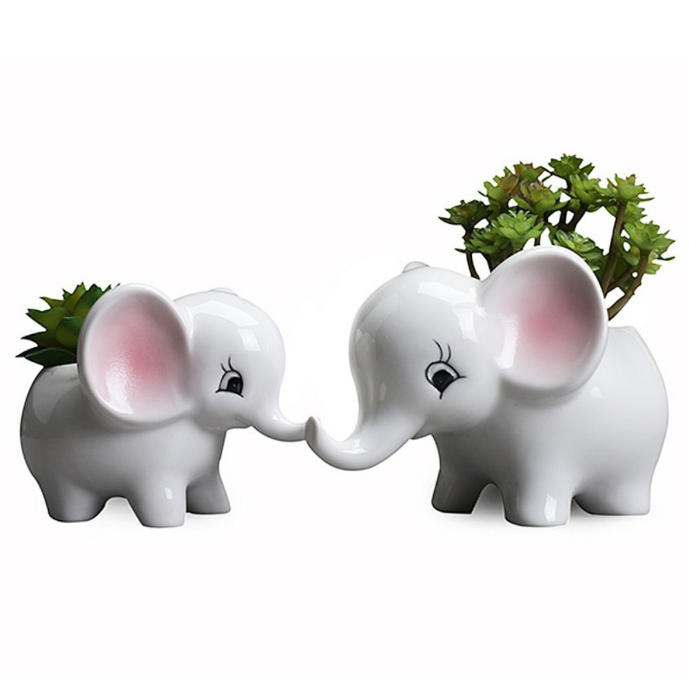 ElephantElegance - Pot de fleurs décoratif sculpté