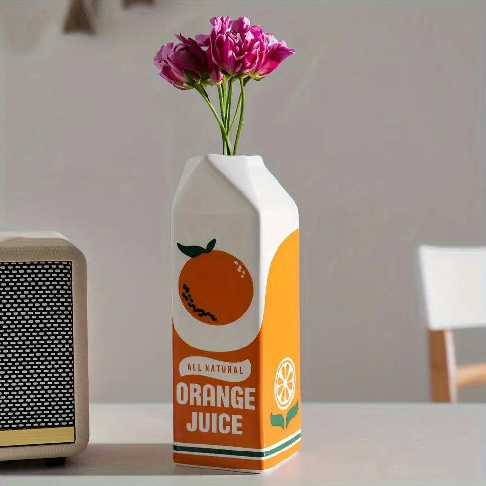 PlayfulBlooms - Vase inspirée de carton de jus d'orange
