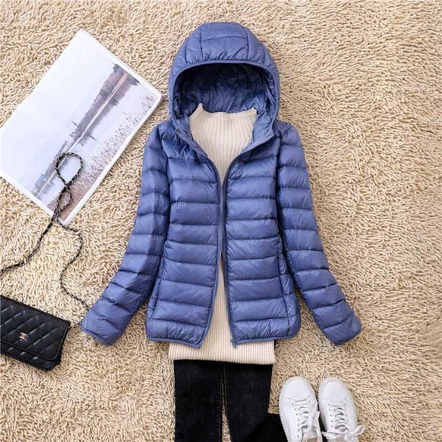 Manteau en duvet ultraléger et compactable avec capuche Nova