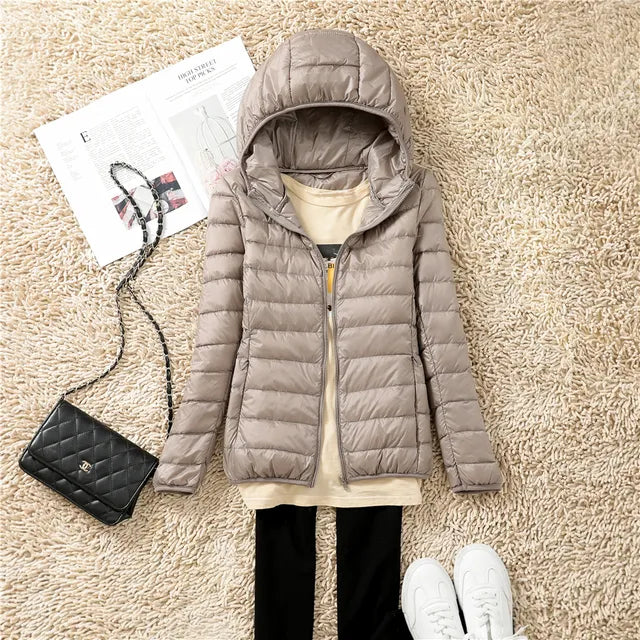 Manteau en duvet ultraléger et compactable avec capuche Nova