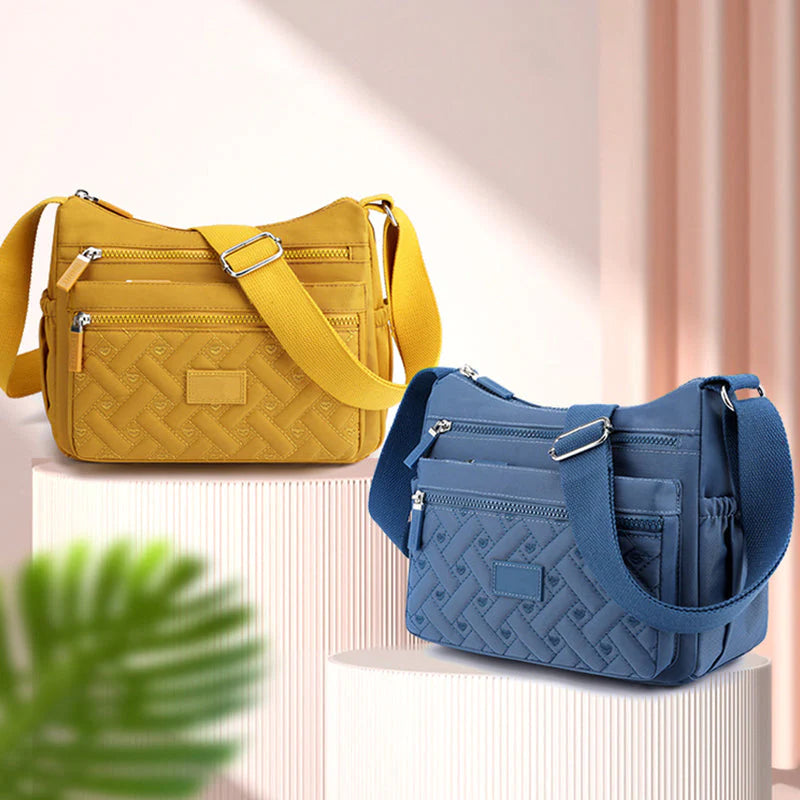 Clara - Sac à dos Let avec sangle ajustable et poches zippées
