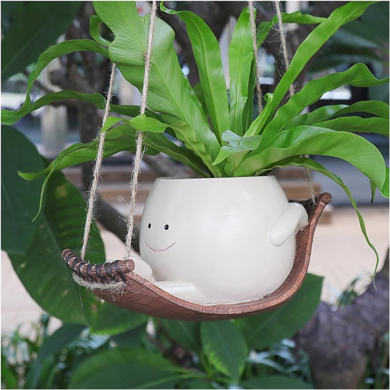 Coffre à plantes souriant en rocking chair