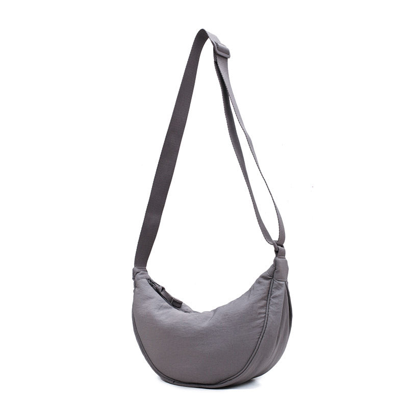 CurveCross - Sac crossbody courbé élégant pour une mode en déplacement