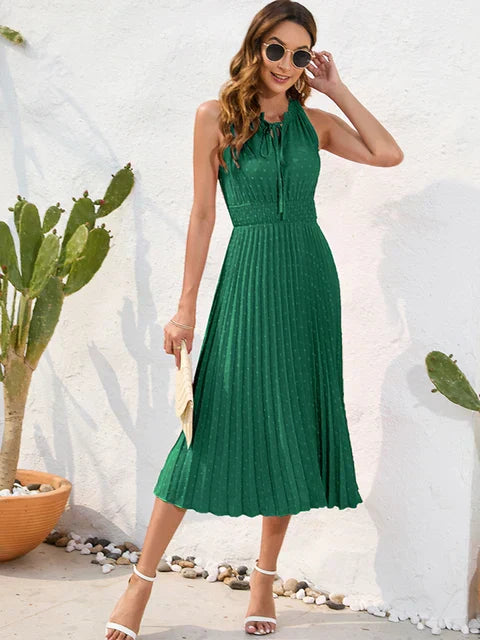 Tania - Élégante robe midi sans manches à œillets plissée