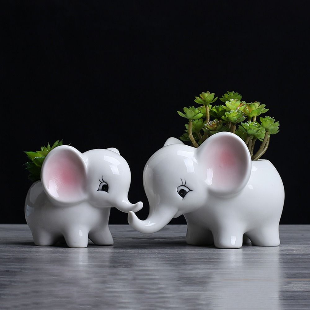 ElephantElegance - Pot de fleurs décoratif sculpté