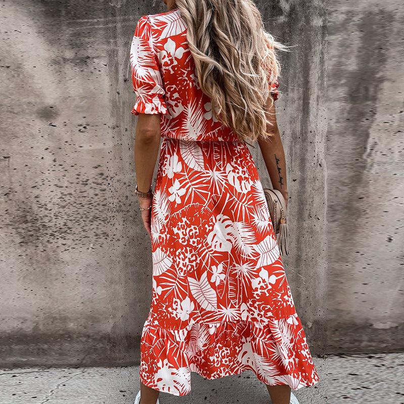 Belinda - Élégante robe midi à fleurs avec charme en V