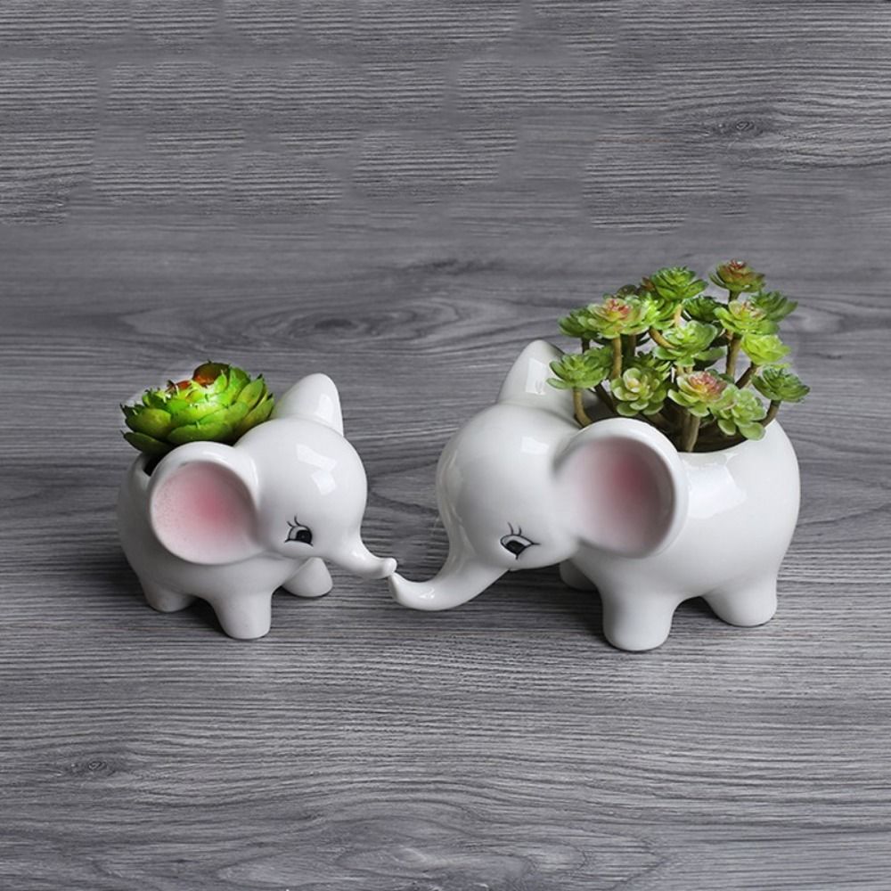 ElephantElegance - Pot de fleurs décoratif sculpté