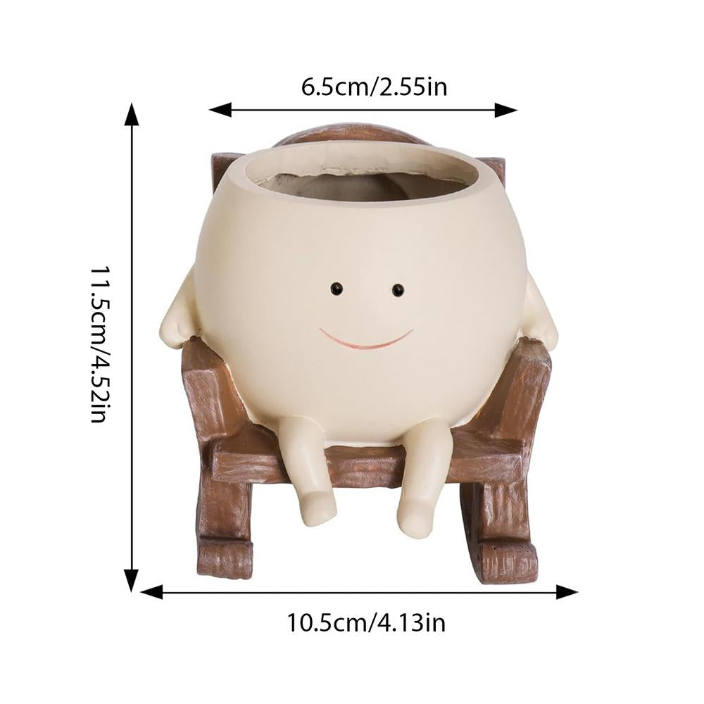 Coffre à plantes souriant en rocking chair
