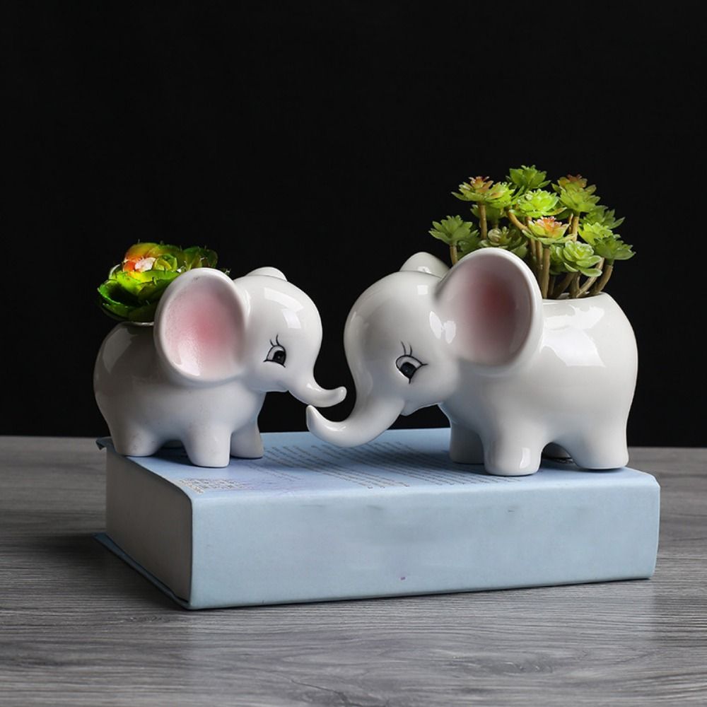 ElephantElegance - Pot de fleurs décoratif sculpté
