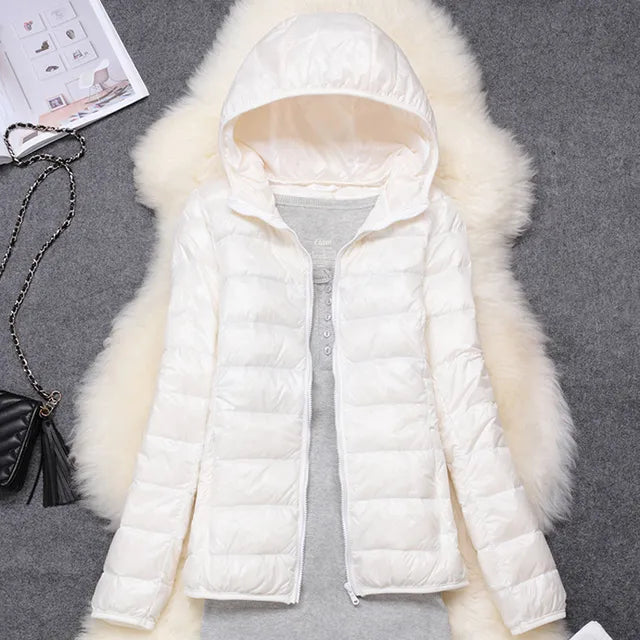Manteau en duvet ultraléger et compactable avec capuche Nova