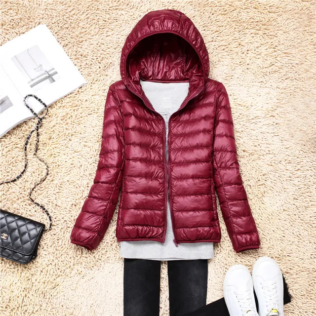Manteau en duvet ultraléger et compactable avec capuche Nova