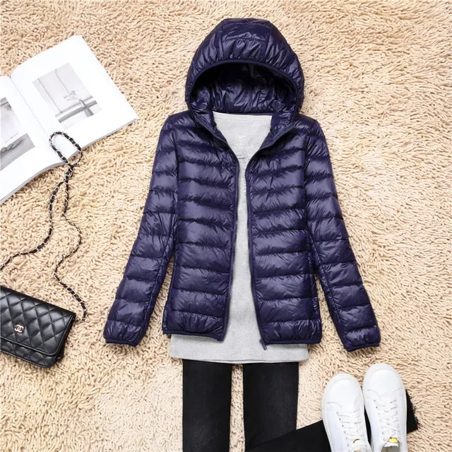 Manteau en duvet ultraléger et compactable avec capuche Nova