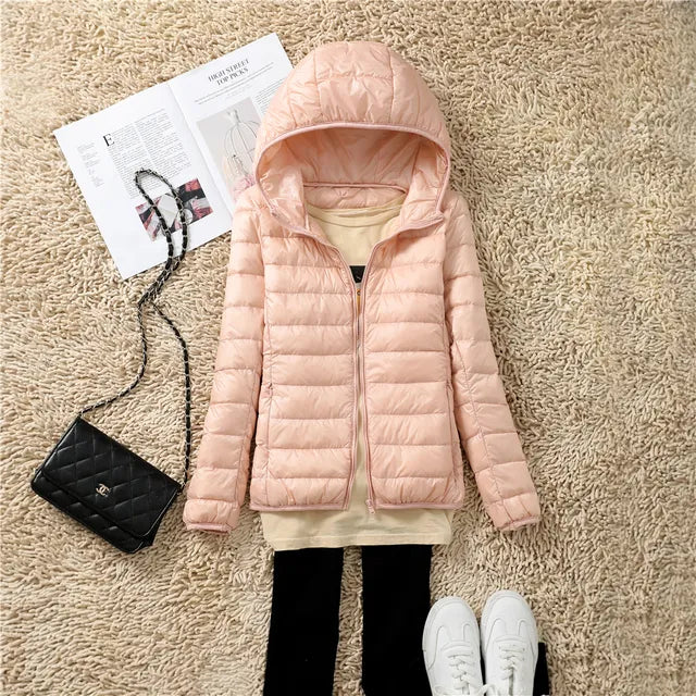 Manteau en duvet ultraléger et compactable avec capuche Nova