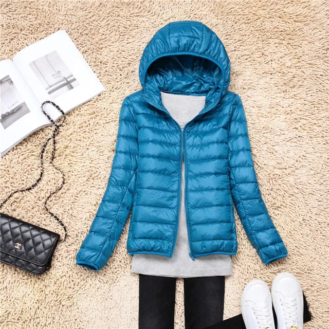 Manteau en duvet ultraléger et compactable avec capuche Nova