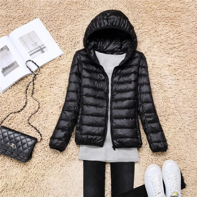 Manteau en duvet ultraléger et compactable avec capuche Nova