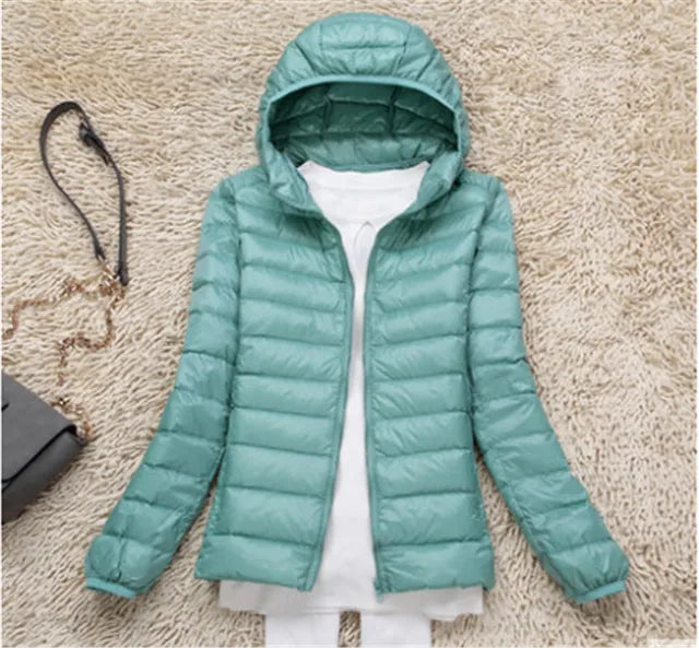 Manteau en duvet ultraléger et compactable avec capuche Nova