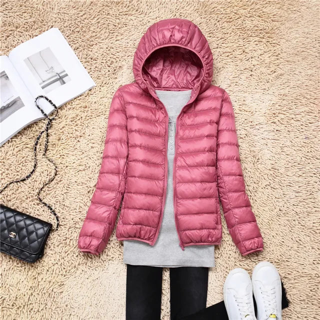 Manteau en duvet ultraléger et compactable avec capuche Nova