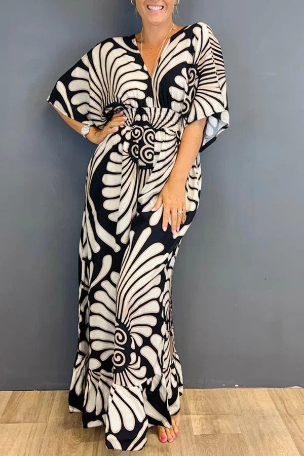 Eliza - Robe maxi florale avec des manches cloche élégantes